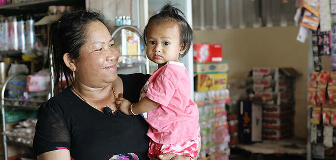 Woman holding toddler